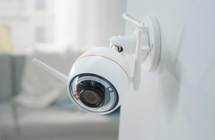 wireless cctv camera mount on the white wall