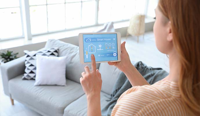 woman using application of smart home automation